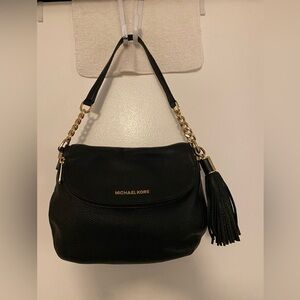 CARRIED TWICE Michael Kors Black Leather Shoulder Bag. Gold hardware. Pockets.